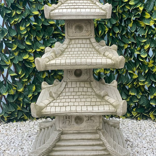 Grand Pagoda Garden Ornament in Stone with three stacked tiers and hand-finished cast stone surface